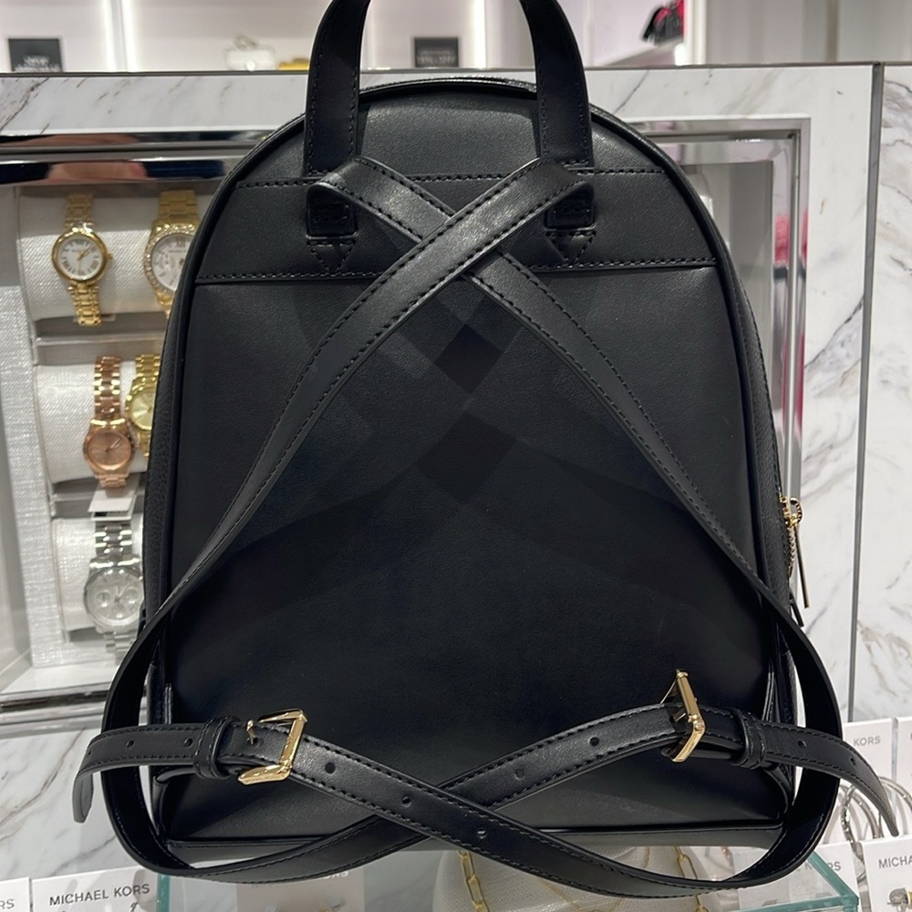 Michael Kors Rhea Medium Pebbled Leather Backpack
Black 
NWT - Picture 8 of 16